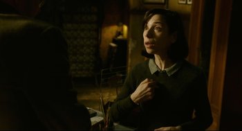 Movie still from “The Shape of Water” (2017), directed by Guillermo del Toro – A woman sitting at a table in front of a mirror; Close Up shot, Over the shoulder angle
