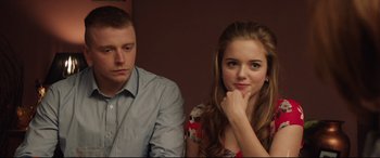 Movie still from “Fighting with My Family” (2019), directed by Stephen Merchant – A man and a woman sitting next to each other; Close Up shot, Over the shoulder angle