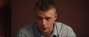 Movie still from “Fighting with My Family” (2019), directed by Stephen Merchant – A person wearing a blue shirt; Close Up shot, Over the shoulder angle