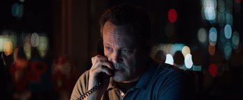 Movie still from “Fighting with My Family” (2019), directed by Stephen Merchant – A person talking on a phone; Close Up shot, High angle