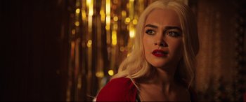 Movie still from “Fighting with My Family” (2019), directed by Stephen Merchant – A woman with blonde hair and a red shirt; Close Up shot, Over the shoulder angle