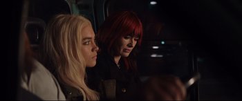 Movie still from “Fighting with My Family” (2019), directed by Stephen Merchant – Two women sitting next to each other on a bus; Close Up shot, High angle