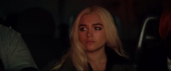 Movie still from “Fighting with My Family” (2019), directed by Stephen Merchant – A beautiful young woman with long blonde hair and green eyes; Close Up shot, Over the shoulder angle