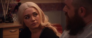 Movie still from “Fighting with My Family” (2019), directed by Stephen Merchant – A woman with long blonde hair sitting next to a man; Close Up shot, Over the shoulder angle