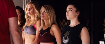 Movie still from “Fighting with My Family” (2019), directed by Stephen Merchant – A group of women standing next to each other; Medium shot, Low angle