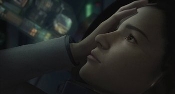 Movie still from “Final Fantasy: The Spirits Within” (2001), directed by Hironobu Sakaguchi – A woman with her hand on her head looking up; Close Up shot, High angle