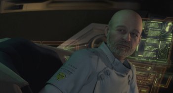 Movie still from “Final Fantasy: The Spirits Within” (2001), directed by Hironobu Sakaguchi – A man sitting in the back seat of a car; Close Up shot, Over the shoulder angle