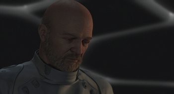 Movie still from “Final Fantasy: The Spirits Within” (2001), directed by Hironobu Sakaguchi – A man with a bald head is looking down at the ground; Close Up shot, Over the shoulder angle