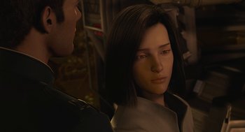 Movie still from “Final Fantasy: The Spirits Within” (2001), directed by Hironobu Sakaguchi – A man standing next to a woman in front of a building; Close Up shot, Over the shoulder angle