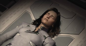 Movie still from “Final Fantasy: The Spirits Within” (2001), directed by Hironobu Sakaguchi – A woman laying on top of a bed in a room; Close Up shot, High angle
