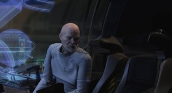 Movie still from “Final Fantasy: The Spirits Within” (2001), directed by Hironobu Sakaguchi – A man sitting in a car with his head resting on his arm; Medium shot, Over the shoulder angle