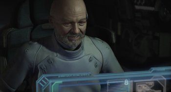 Movie still from “Final Fantasy: The Spirits Within” (2001), directed by Hironobu Sakaguchi – A bald man in a white suit looking at a computer screen; Close Up shot, Over the shoulder angle