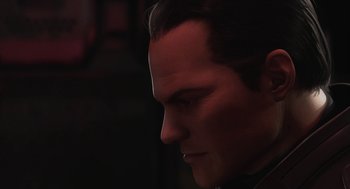 Movie still from “Final Fantasy: The Spirits Within” (2001), directed by Hironobu Sakaguchi – A man's face in the dark; Close Up shot, Over the shoulder angle