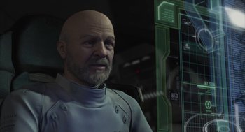 Movie still from “Final Fantasy: The Spirits Within” (2001), directed by Hironobu Sakaguchi – A bald man with a bald head is looking at a computer screen; Close Up shot, Over the shoulder angle