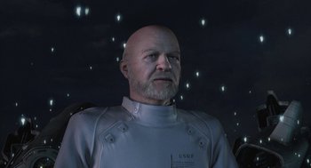 Movie still from “Final Fantasy: The Spirits Within” (2001), directed by Hironobu Sakaguchi – A bald man in a white suit is looking at the camera; Close Up shot, Over the shoulder angle