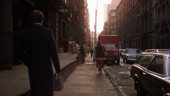 Movie still from “Fingers” (1978), directed by James Toback – People walking down the sidewalk of a busy city street; Wide shot, High angle