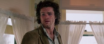 Movie still from “Firestarter” (1984), directed by Mark L. Lester – A person wearing a jacket; Close Up shot, Low angle