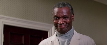 Movie still from “Firestarter” (1984), directed by Mark L. Lester – A person wearing a jacket; Close Up shot, Low angle