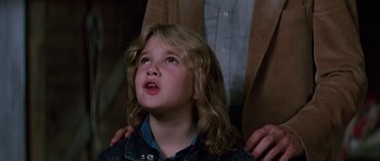 Movie still from “Firestarter” (1984), directed by Mark L. Lester – A young girl looking up into the sky; Close Up shot, Low angle