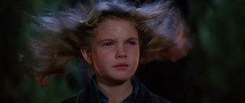 Movie still from “Firestarter” (1984), directed by Mark L. Lester – A young boy with a messy hair style; Close Up shot, Low angle