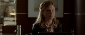 Movie still from “Firewall” (2006), directed by Richard Loncraine – A woman sitting in front of a computer monitor; Close Up shot, Over the shoulder angle