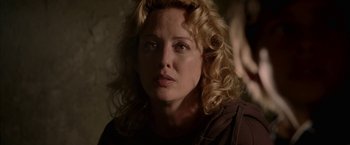 Movie still from “Firewall” (2006), directed by Richard Loncraine – A person with curly hair; Close Up shot, Over the shoulder angle