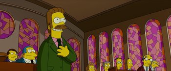 Movie still from “The Simpsons Movie” (2007), directed by David Silverman – A man in a suit and tie standing in front of stained glass windows; Medium shot, Low angle