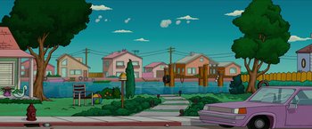 Movie still from “The Simpsons Movie” (2007), directed by David Silverman – An animated picture of a street with houses in the background; Extreme Wide shot, High angle