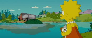 Movie still from “The Simpsons Movie” (2007), directed by David Silverman – A simpsons character is standing in front of a lake; Wide shot, High angle