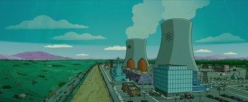 Movie still from “The Simpsons Movie” (2007), directed by David Silverman – A drawing of a nuclear power plant in the middle of a town; Extreme Wide shot, High angle