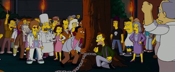 Movie still from “The Simpsons Movie” (2007), directed by David Silverman – A group of people standing next to each other; Wide shot, High angle