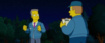 Movie still from “The Simpsons Movie” (2007), directed by David Silverman – Two men are standing next to each other; Medium shot, Over the shoulder angle