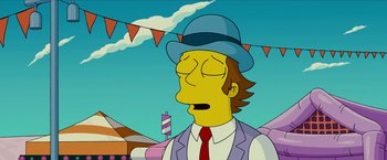 Movie still from “The Simpsons Movie” (2007), directed by David Silverman – A man in a blue hat and a suit and tie; Medium shot, Low angle