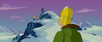 Movie still from “The Simpsons Movie” (2007), directed by David Silverman – A man standing in front of a hill with two other people standing on top of it; Extreme Wide shot, Over the shoulder angle
