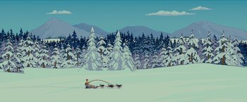 Movie still from “The Simpsons Movie” (2007), directed by David Silverman – A man riding a dog sled down a snow covered slope; Extreme Wide shot, High angle