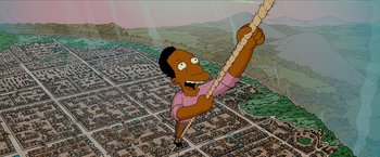 Movie still from “The Simpsons Movie” (2007), directed by David Silverman – An animated picture of a person on a rope; Extreme Wide shot, Overhead angle