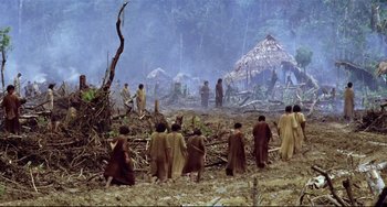 Movie still from “Fitzcarraldo” (1982), directed by Werner Herzog – A group of people standing in a field; Extreme Wide shot, High angle