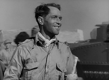 Movie still from “Five Graves to Cairo” (1943), directed by Billy Wilder – An old photo of a man with a toothbrush in his mouth; Close Up shot, Low angle
