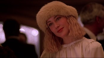Movie still from “Flashdance” (1983), directed by Adrian Lyne – A person wearing a fur hat; Close Up shot, Low angle