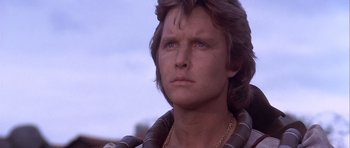 Movie still from “Flesh+Blood” (1985), directed by Paul Verhoeven – A person with long hair; Close Up shot, Low angle