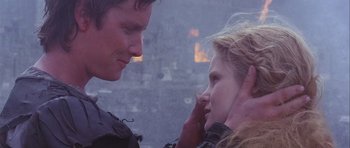 Movie still from “Flesh+Blood” (1985), directed by Paul Verhoeven – A man and a woman looking at each other; Close Up shot, Low angle