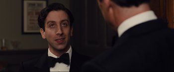 Movie still from “Florence Foster Jenkins” (2016), directed by Stephen Frears – A man in a tuxedo looking at himself in the mirror; Close Up shot, Over the shoulder angle