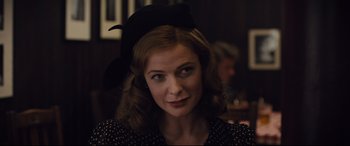 Movie still from “Florence Foster Jenkins” (2016), directed by Stephen Frears – A person wearing a hat; Close Up shot, Over the shoulder angle