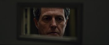 Movie still from “Florence Foster Jenkins” (2016), directed by Stephen Frears – A person looking through a window; Close Up shot, Low angle