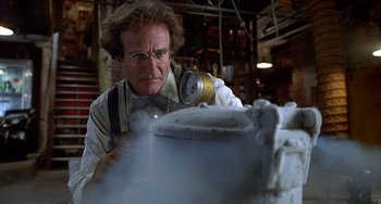 Movie still from “Flubber” (1997), directed by Les Mayfield – A man in a white shirt and a tie; Medium shot, Low angle