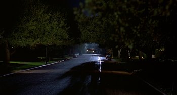 Movie still from “Flubber” (1997), directed by Les Mayfield – A street at night lit by street lights; Extreme Wide shot, High angle