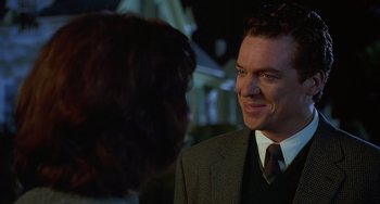 Movie still from “Flubber” (1997), directed by Les Mayfield – A man and a woman talking to each other; Close Up shot, Over the shoulder angle