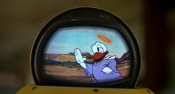 Movie still from “Flubber” (1997), directed by Les Mayfield – A television screen showing a cartoon character; Close Up shot, Low angle