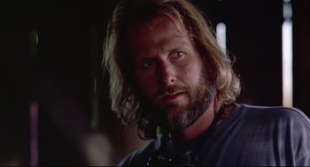 Movie still from “Fly Away Home” (1996), directed by Carroll Ballard – A person with long hair and a beard; Close Up shot, Low angle