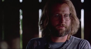 Movie still from “Fly Away Home” (1996), directed by Carroll Ballard – A person with long hair wearing glasses; Close Up shot, Low angle